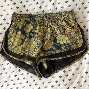 Urban Outfitters gold & black active shorts